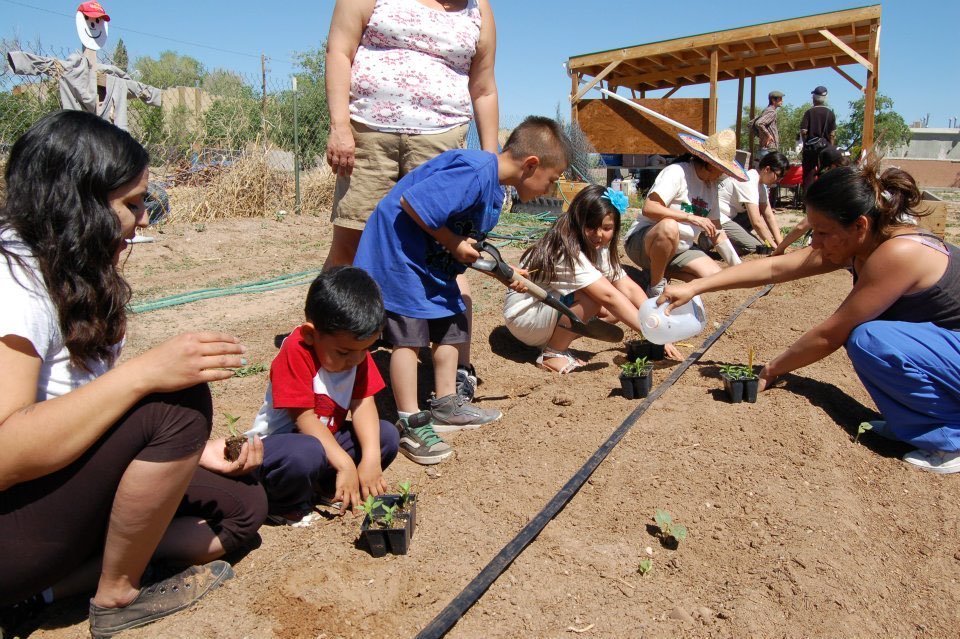 Children working in the International District Community Garden, which is home to Feed the Hood, SWOP’s food justice and community gardening initiative.