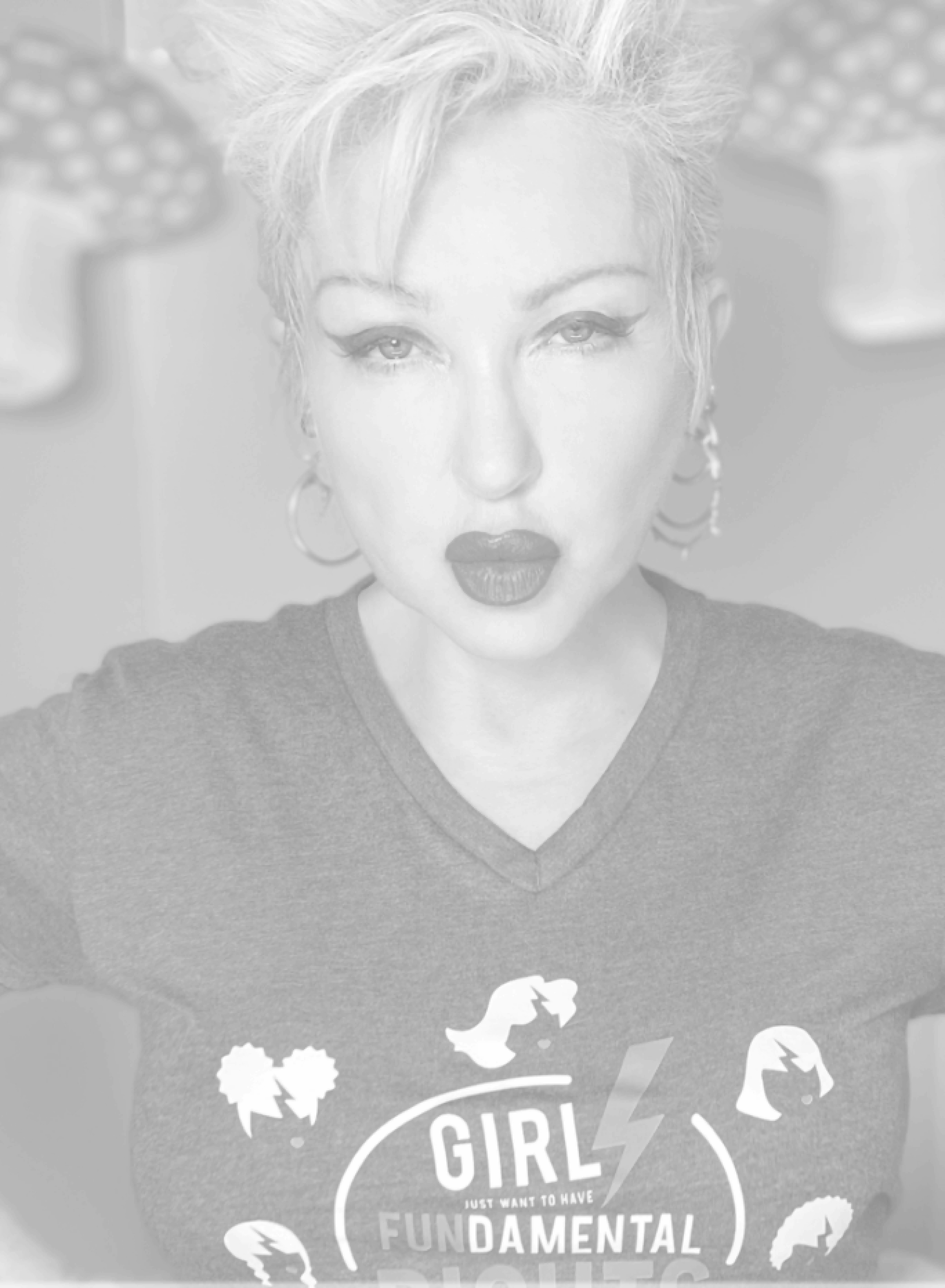 black and white headshot of Cyndi Lauper