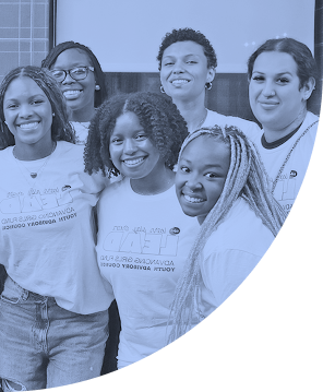 Five smiling women posing together, representing the Tides Foundation Advancing Girls Fund Youth Advisory Council.