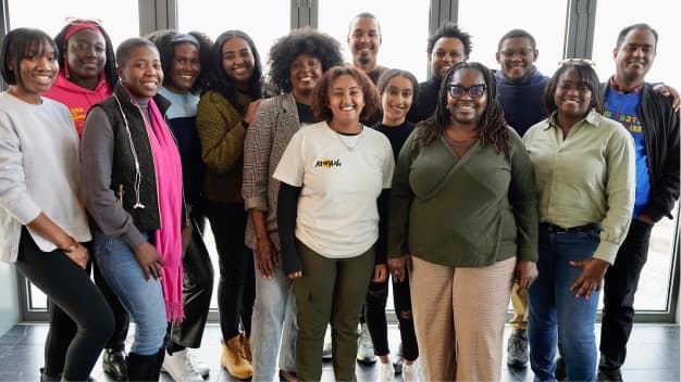 A group photo of majority Black women leaders from the Black Alliance for Just Immigration.