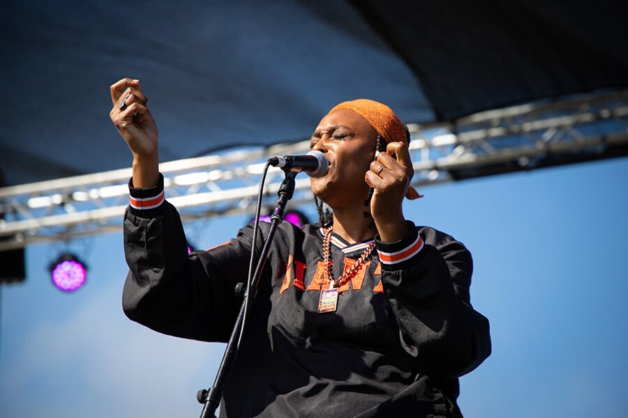A Black woman speaker at the 6th annual Environmental Justice Summit hosted by Hip-Hop for Change in the Presidio in San Francisco.