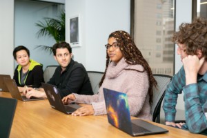 A group of colleagues at a meeting. 