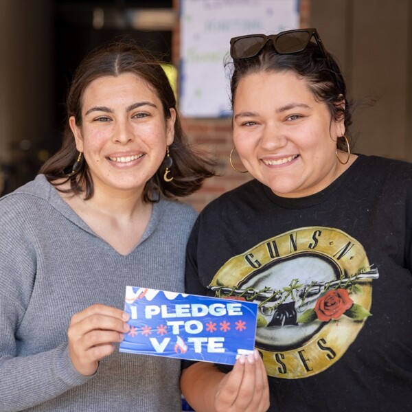 Two organizers with Leaders Igniting Transformation, a partner of Alliance for Youth Organizing.