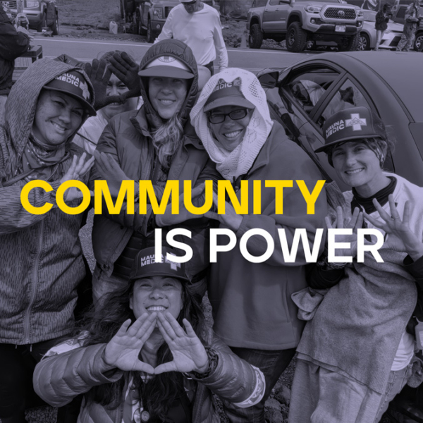 Headline: Community is Power. Image of medical workers smiling and displaying triangle hand signs